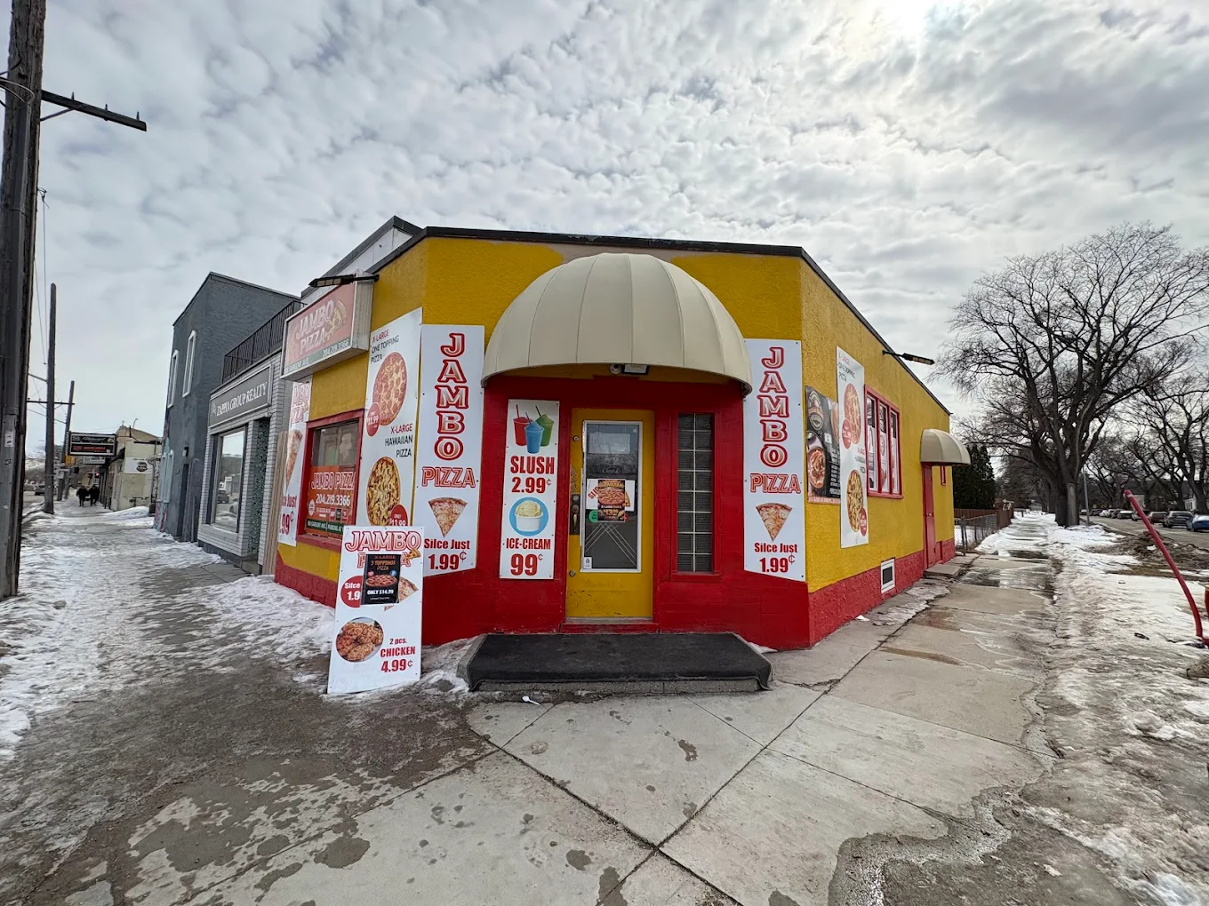 Jambo Pizza storefront on the corner of Sargent Ave, Winnipeg West End